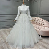 Luxury Muslim Wedding Dress for Bride Dubai Arabic Long Sleeve A Line Hijab Bridal Gown Lace Appliques Beaded Vestidos